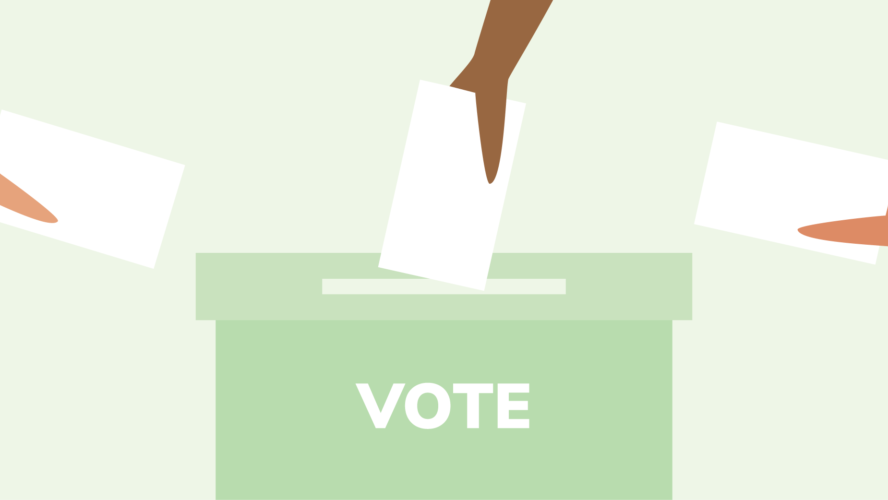 Three hands holding ballot papers, putting them in a green ballot box that says 'vote' on it.