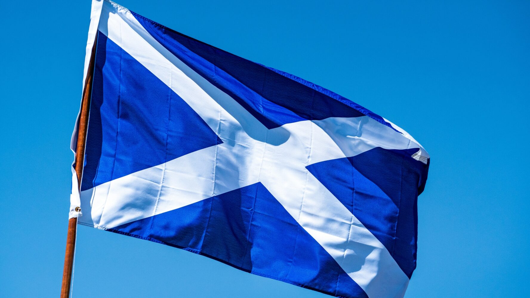 The Scotland flag against a blue sky