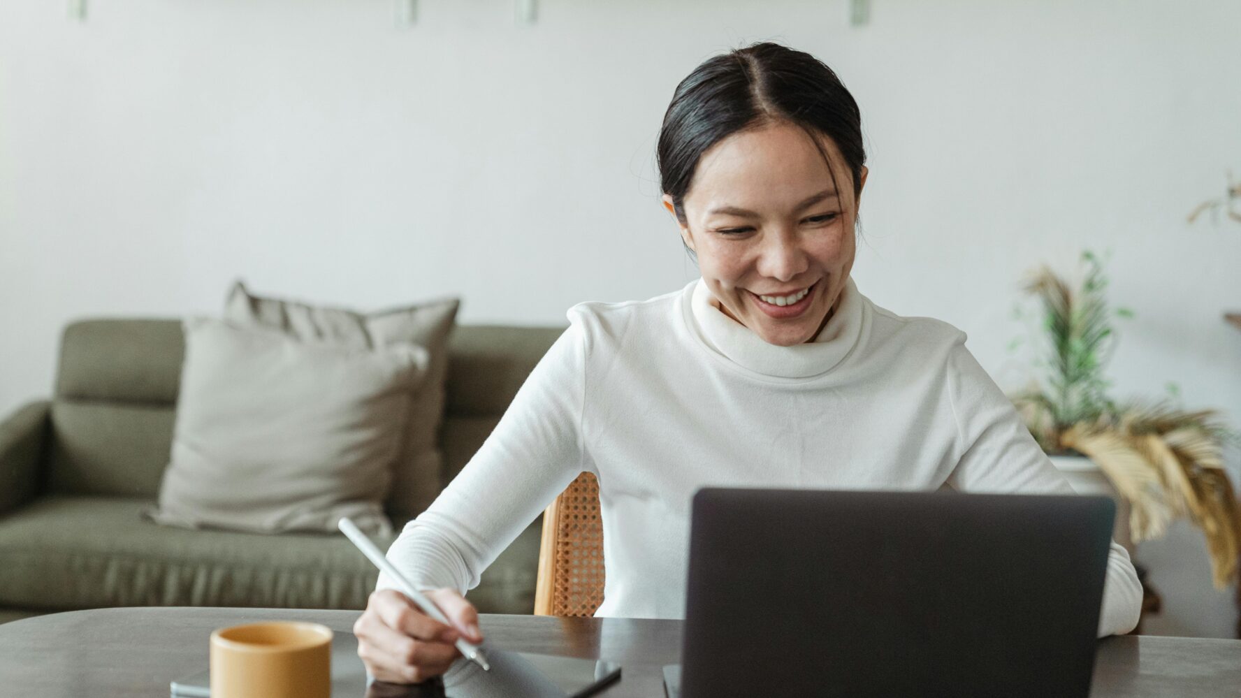 smiling woman working at desk