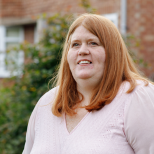 Former CAP client, Clare, smiling with relief at being given a fresh start, free from debt.