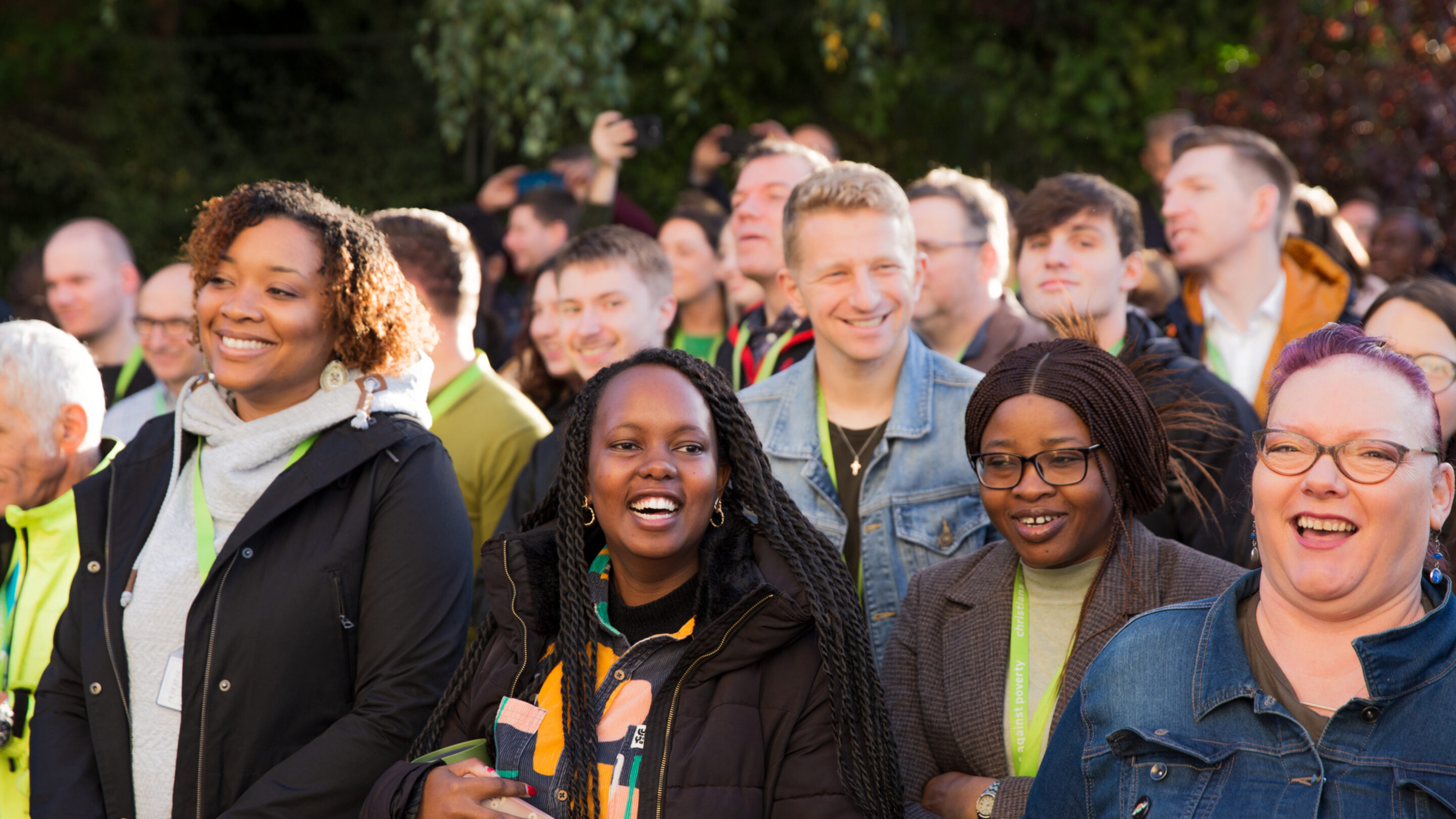 A group of smiling and laughing CAP staff members.