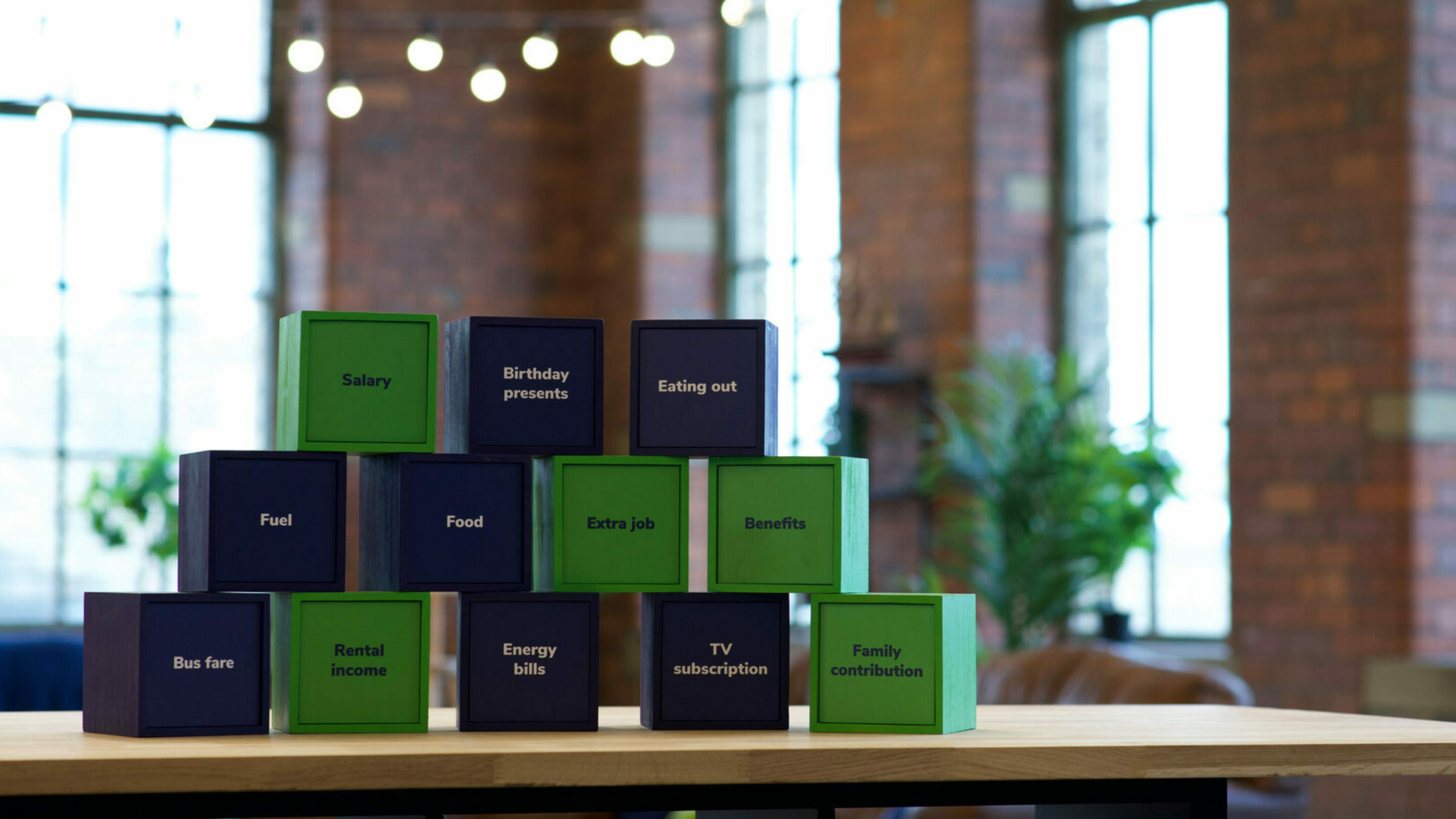 Green and blue CAP branded building blocks.