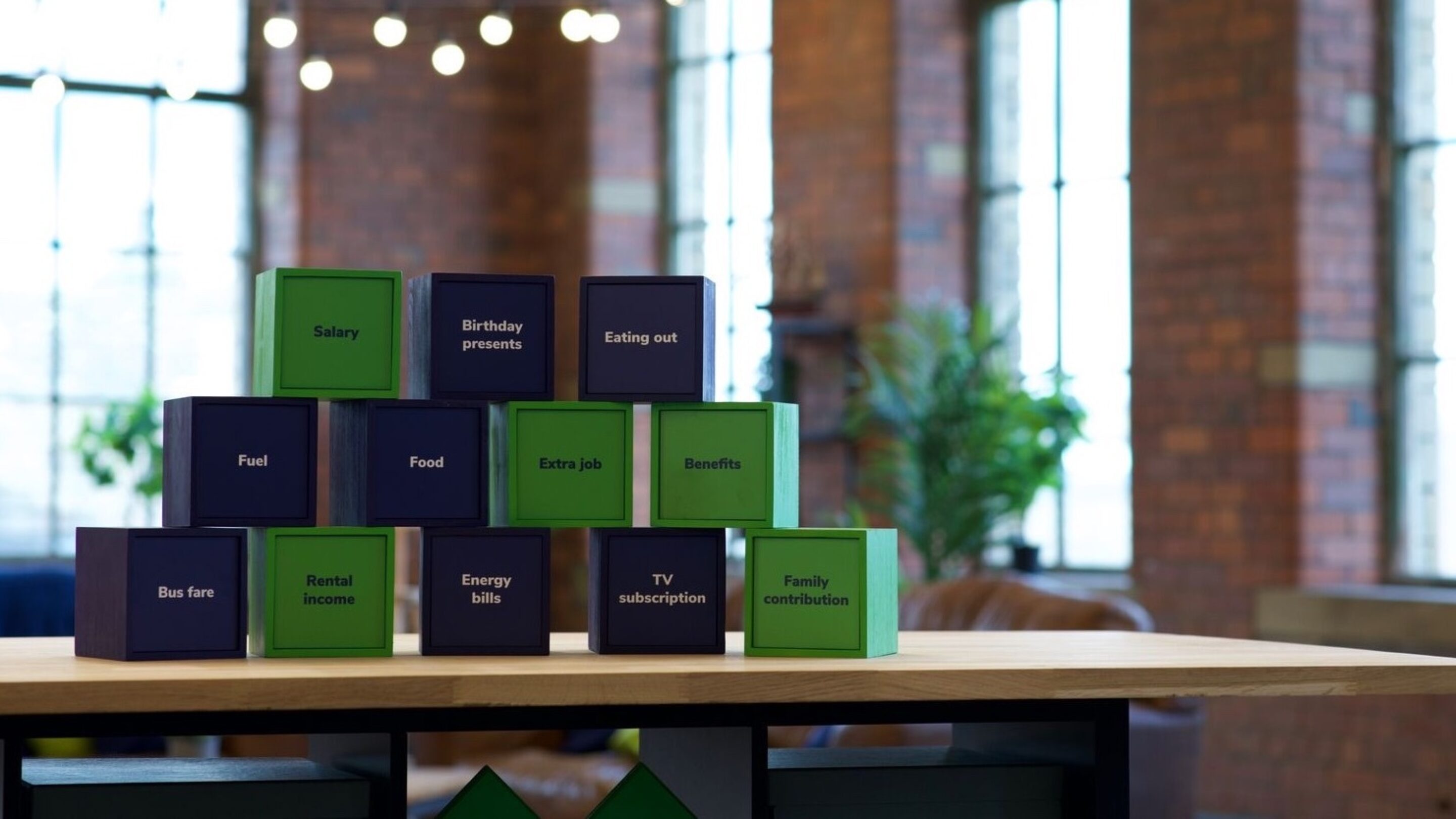 Green and blue CAP branded building blocks.