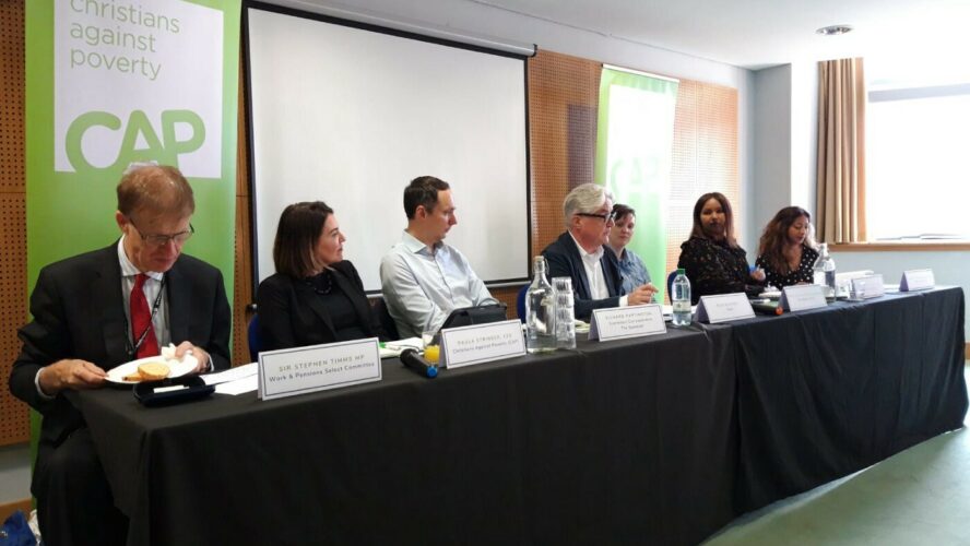 Panel members of the CAP Labour Party conference fringe event sit along a table facing the audience.