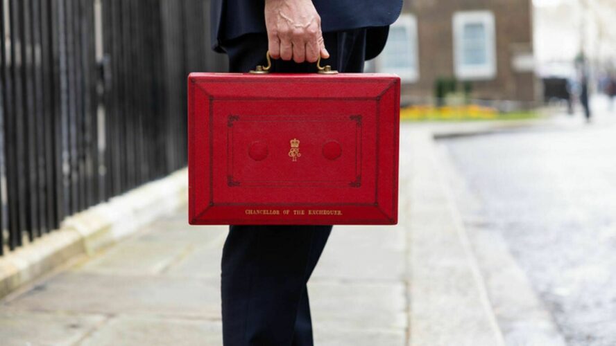 Man holding red box