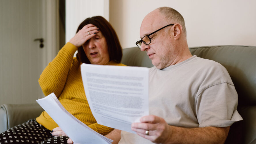 couple looking at bills