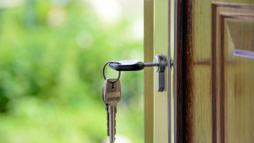 Key in a front door.