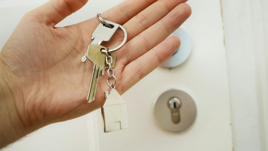 Person holding house keys