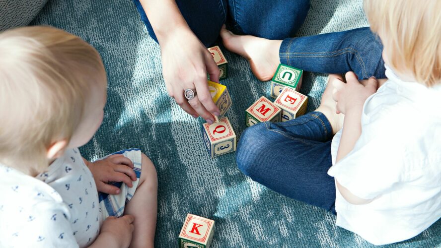 Children playing with toy blocks