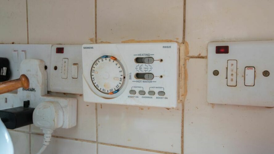 Picture showing heating thermostat in the home