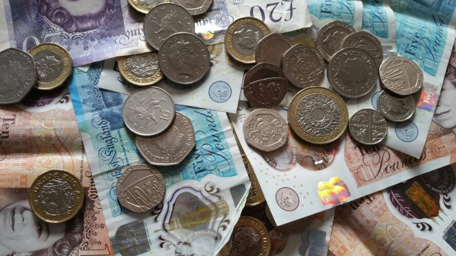 Close up photo of British coins and notes
