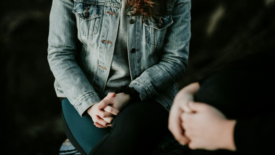 Two people sitting together