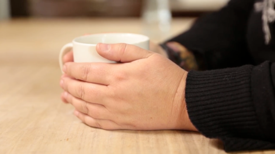 woman holding cup