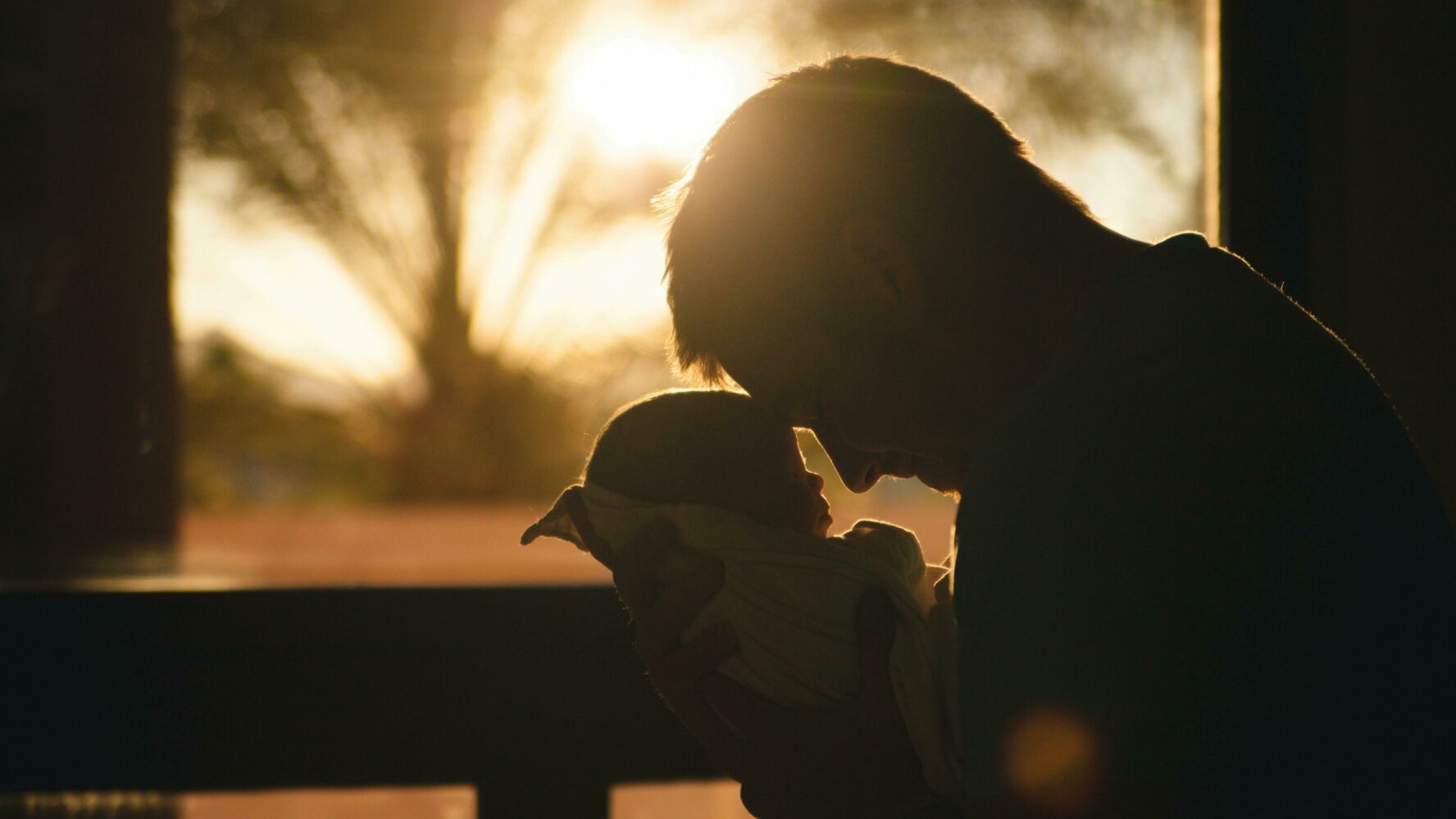 new born baby with daddy