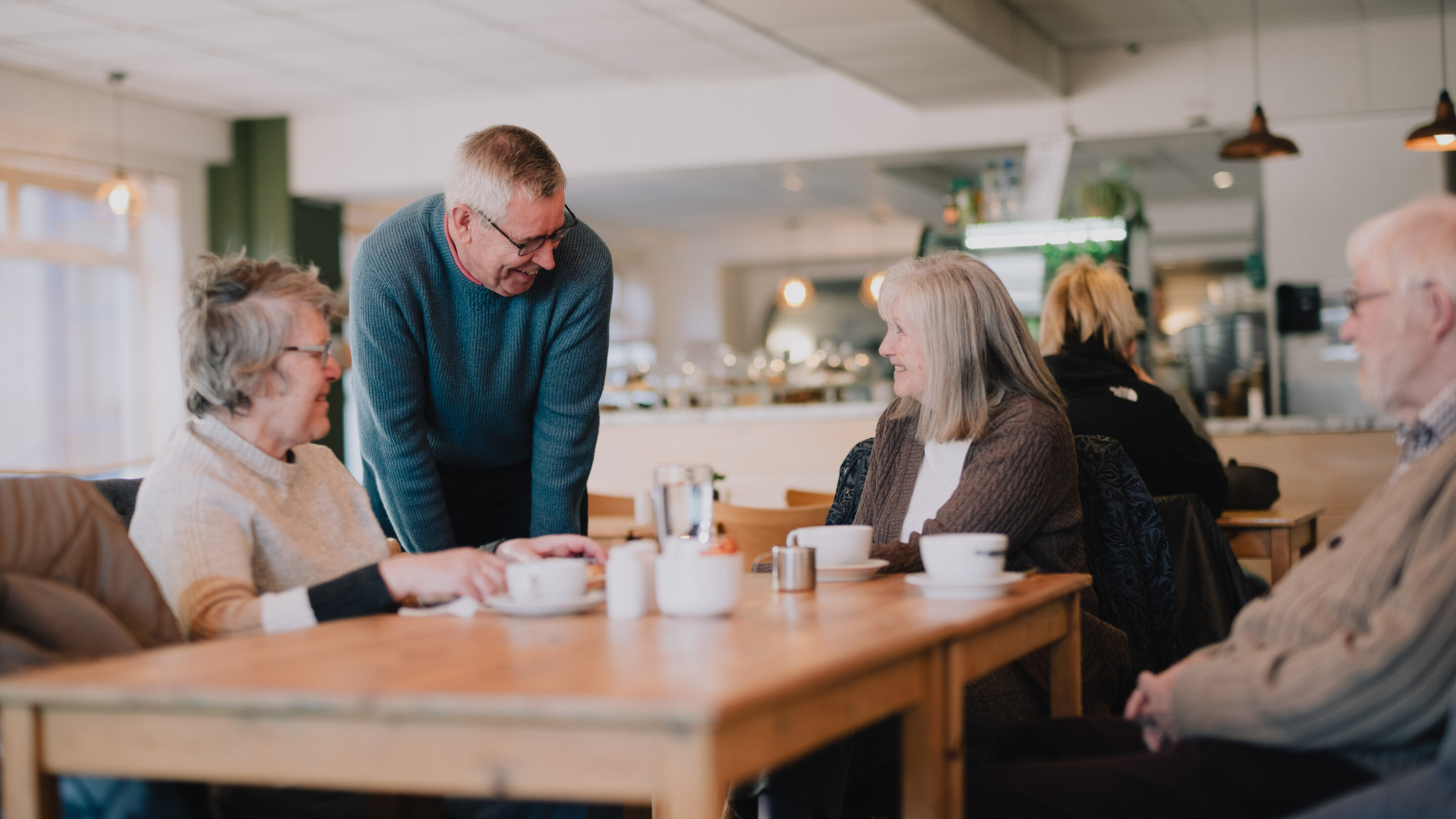 debt coach speaking to members of the community