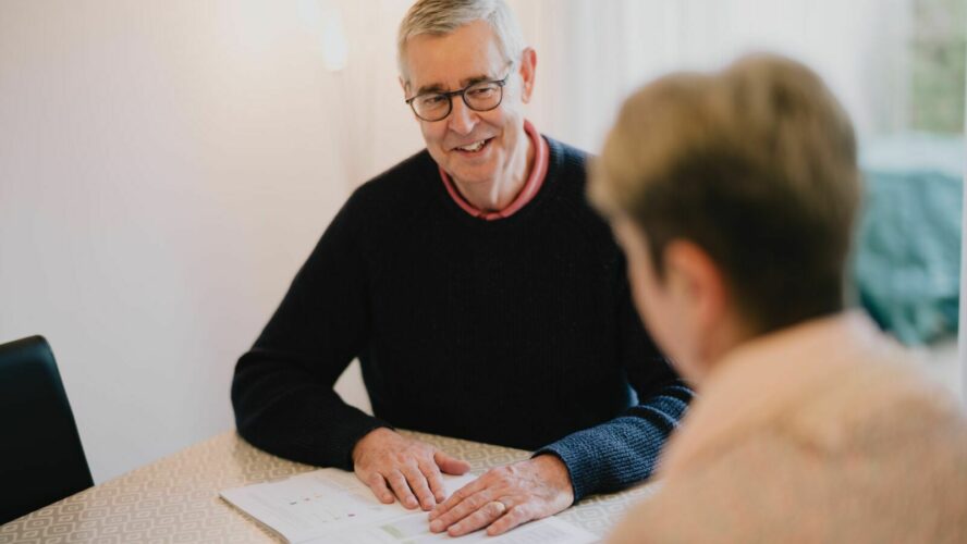 Debt coach Steve, running through a CAP booklet with a client